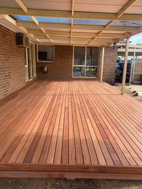 After: finished hardwood deck under the pergola